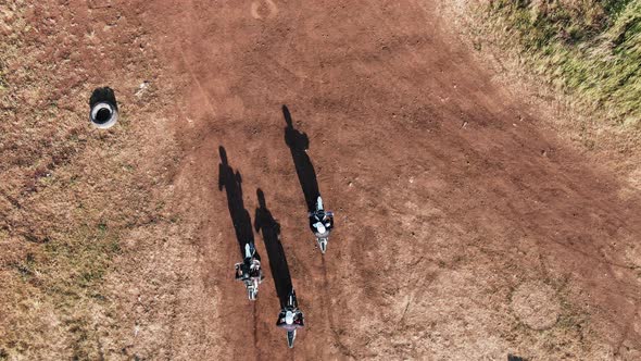 Aerial of Sportsmen Racing on Motorcycles on Off-Road Track