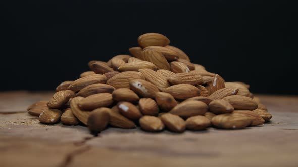 Pile Of Almonds An A Wooden Table