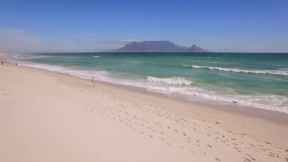 Aerial travel drone view of Table Mountain, Table Bay from Bloubergstrand, Cape Town, South Africa.