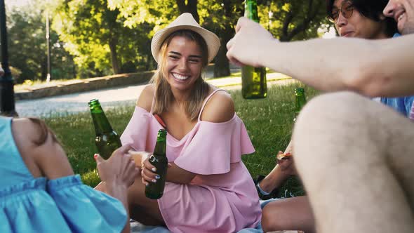 Young Friends Having Picnic in Park