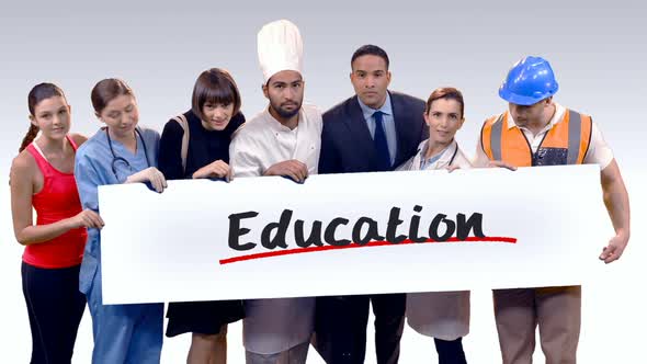 Various professional holding placard of education text