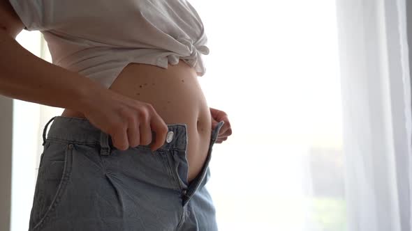 Overweight Woman Wearing Jeans on Fat Body Belly Paunch
