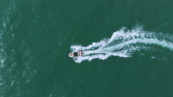 Motorboat Sailing In The Calm Turquoise Sea In Benidorm Spain  Water Sports