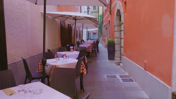 Cozy Street Cafe with Perfectly Served Tables in Old Town