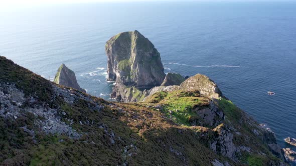 Flying Above the Cobblers Tower at Glenlough Bay Between Port and Ardara in County Donegal is