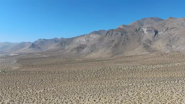 Aerial View of Desert Hills Under Blue Sky in California's Mojave Desert, Near Ridgecrest. 