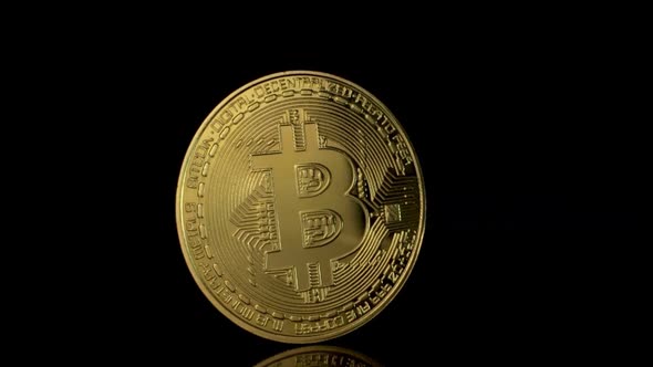 Bitcoin Fall on a Black Background 