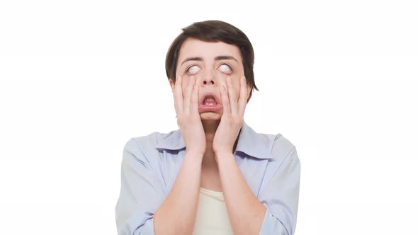 Very Dissapointed Caucasian Brunette Female Making Double Facepalm Over White Background