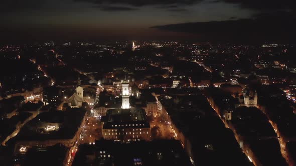 Flight Above the Roofs on Sunset. Old European City. Ukraine Lviv