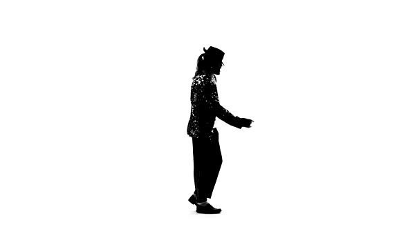 Silhouette of a Young Man Dancer Dancing in Style Michael Jackson on White Background. Close Up