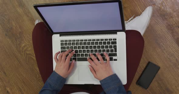 Caucasian woman using a laptop