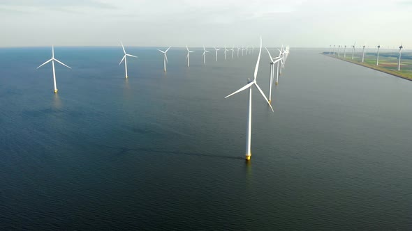 Windmill Park in the Ocean Drone Aerial View of Windmill Turbines Generating Green Energy Electric