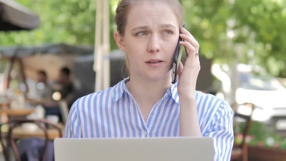 Outdoor Close Up of Shocked Young Woman