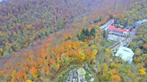 Panorama on small village in a mountain valley of the Carpathian mountains an autumn seasonal time