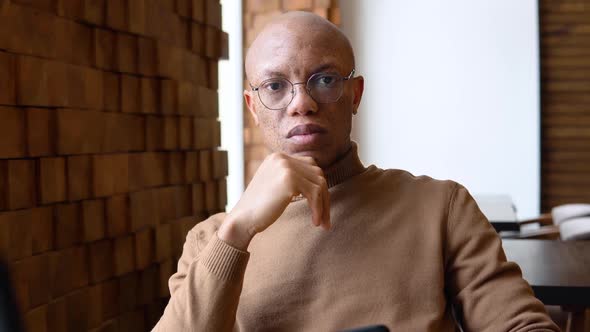 Young African Man in Camel Cashmere Sweater