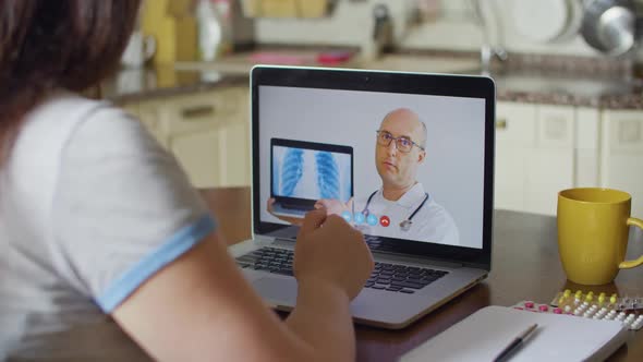Practitioner Doctor Consulting By Telemedicine Online