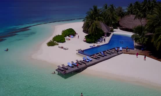 Aerial drone seascape of island beach by blue ocean and sand background