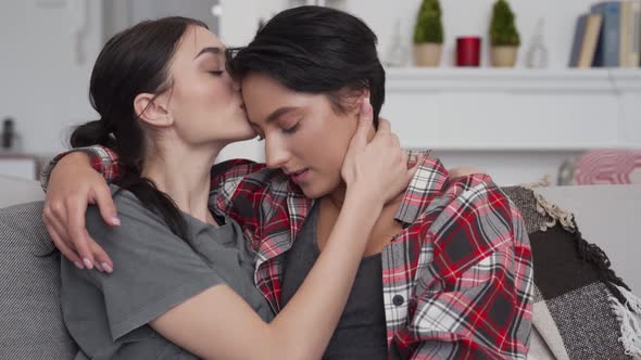 Two Women Lesbian Lgbtq Couple Enjoying Bonding Chilling Cuddling and Kissing