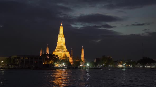 Wat Arun After Sunset. Bangkok, Thailand. Panning Shot