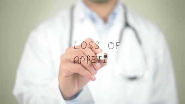 Loss of Appetite, Doctor Writing on Transparent Screen alt