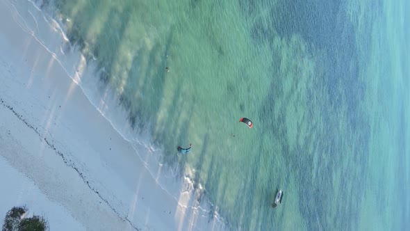 Vertical Video of the Ocean Near the Coast of Zanzibar Tanzania Aerial View