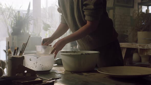 Woman Is Mixing Ceramic Glaze