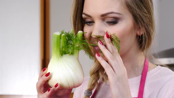 Girl smell Fennel Bulb