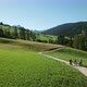 Three people cycling in landscape, Alta Badia, Italy - VideoHive Item for Sale