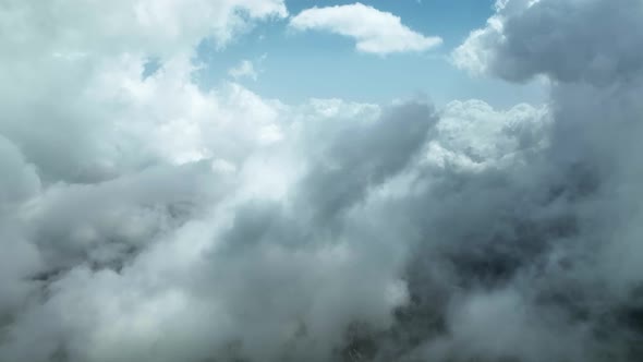 Cloudy landscape high in the mountains aerial view 4 K