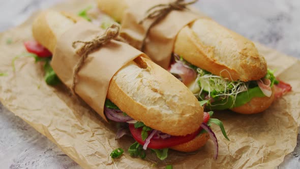 Tasty Homemade Sandwiches Baguettes with Various Healthy Ingredients. Breakfast Take Away Concept