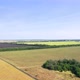Aerial photography of agricultural fields in Russia. Beautiful views. Sunny day. - VideoHive Item for Sale