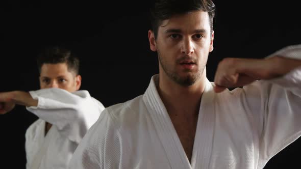 Men practicing karate