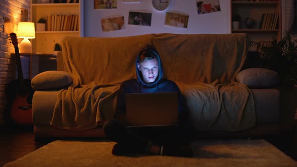 Teenager Surfing in Internet Visiting Gambling Sites Winning Money, Young Hacker