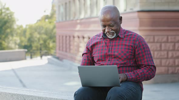 Satisfied African American Client Elderly Man Showing Thumb Up Gesture Complacent with Service