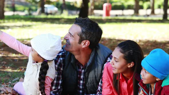 Family taking selfie in the park