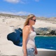 Female tourist walking on Sarakiniko Beach in Milos, Greece - VideoHive Item for Sale
