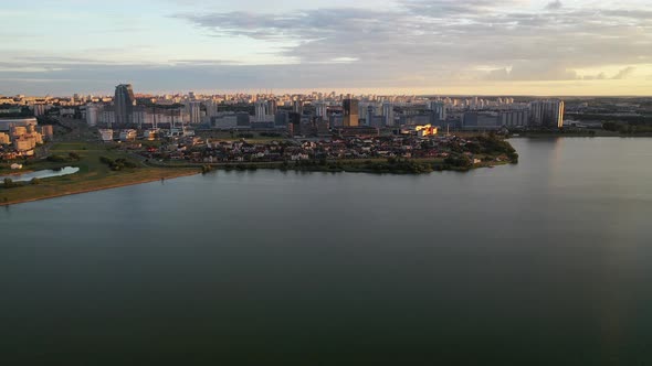 Picturesque Sunset on the Drozdy Reservoir with a View of the City of Minsk. Belarus