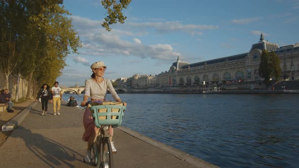 Attractive woman on a bicycle in Paris