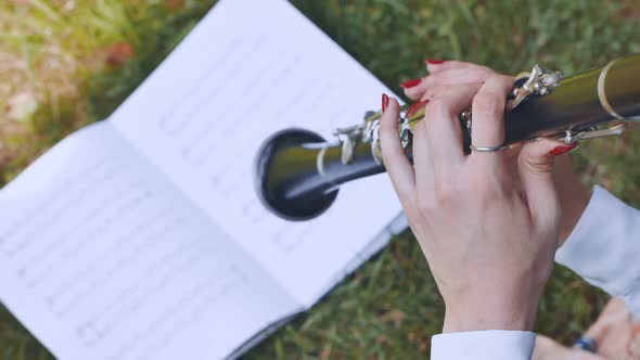 The Girl Plays the Clarinet By Notes