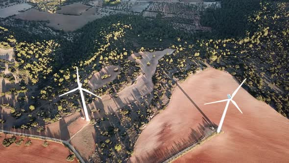 Aerial View of a Field of Wind Generators During Sunset Near Madrid. Spain in the Fall