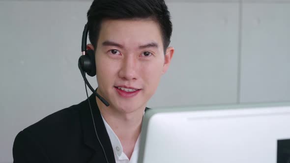 Business People Wearing Headset Working in Office