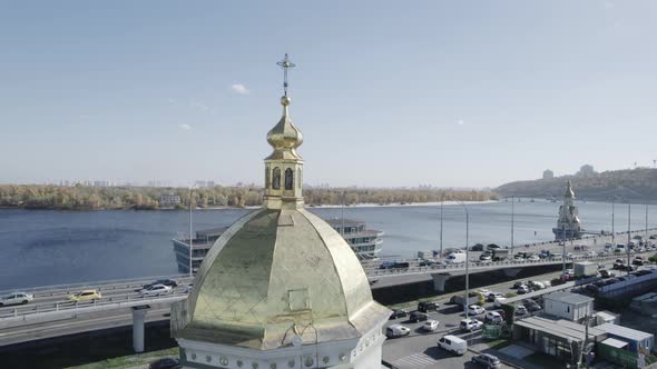 Aerial View on Cupola of the Church on the River Background