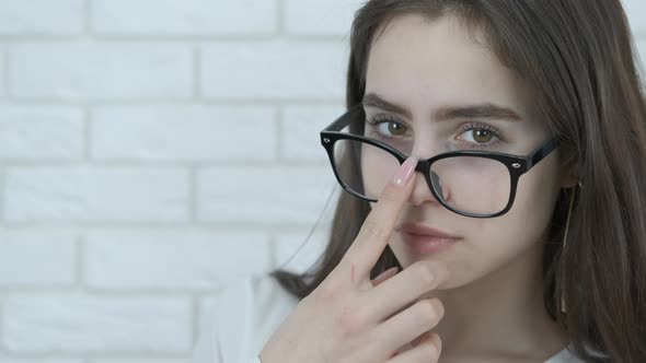 Business woman with glasses.