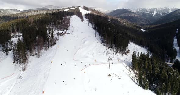 Aerial View of the Ski Resort in Mountains at Winter