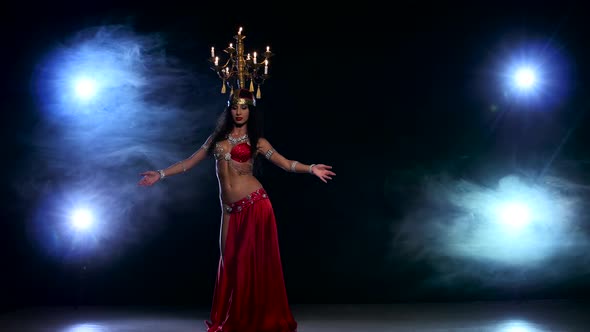 Attractive Belly Dancer Girl Starts Dancing with Candles on Her Head, Black, Smoke