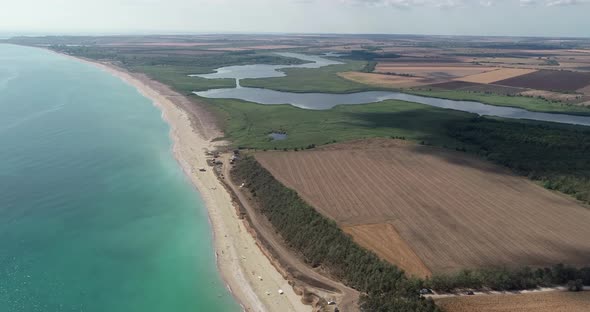 Beautiful landscape of lake, forest, beach and sea. Ezerets and Shabla lakes 