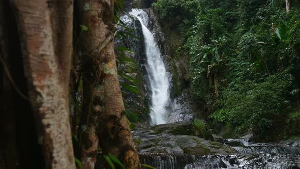 Pan of a waterfall in Ranong Thailand.