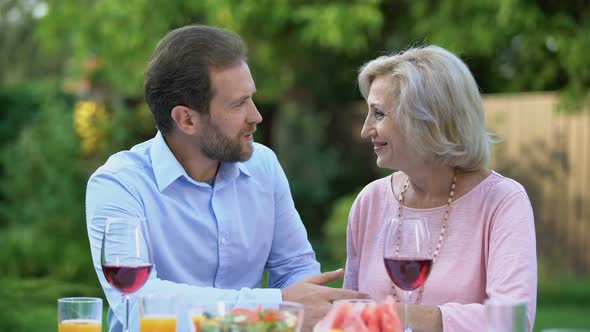 Successful Adult Son Thanking Mother for Upbringing, Emotional Embrace Love