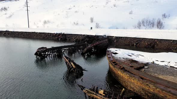 Old sunken fishing boats on the shore