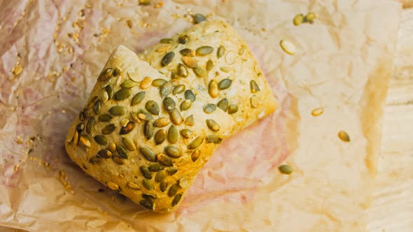 Two Freshly Baked Square Loaves of Bread with Pumpkin Seeds